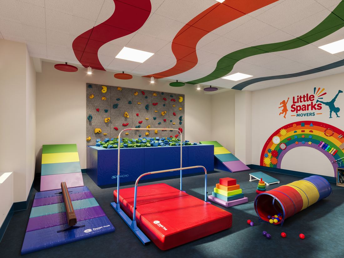 The Little Sparks Kids Gym: a climbing wall, foam pit, low bars, balance beam, rainbow tumbling mats, and a play tunnel